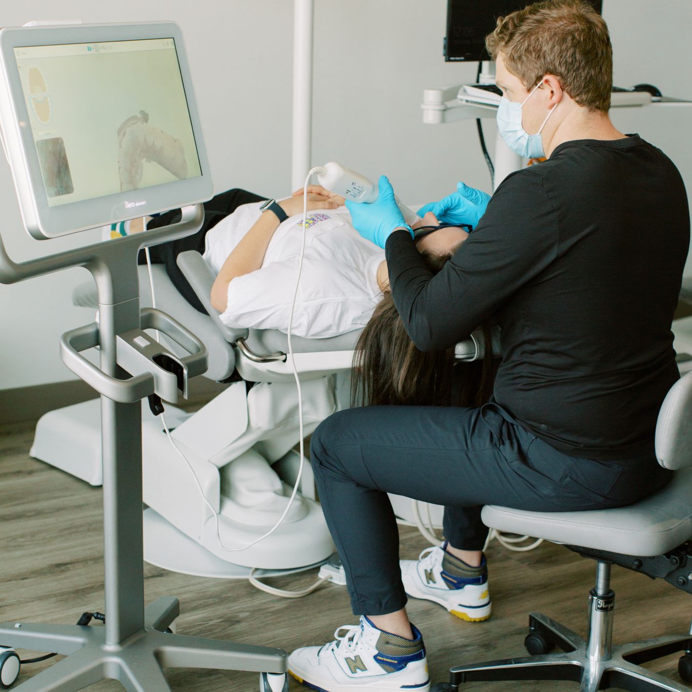 Dr. Jared working with a patient